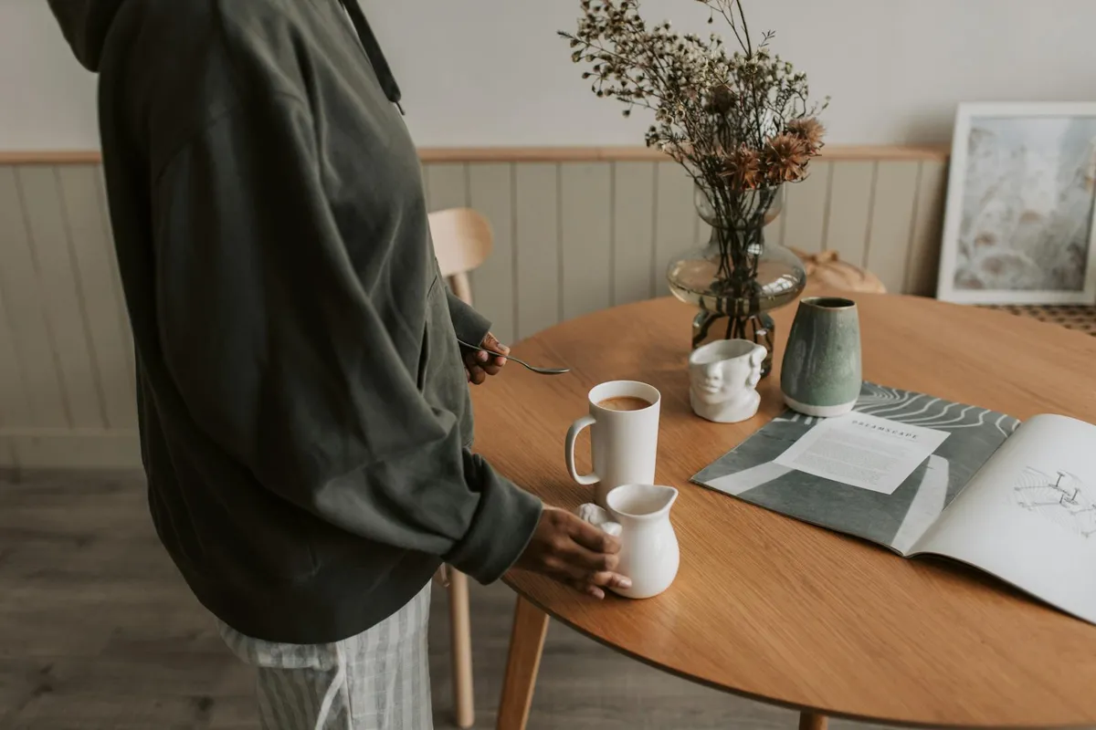 A peaceful modern morning lifestyle scene with coffee and plants